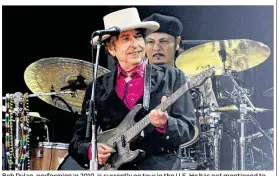  ?? GARETH FULLER / PA WIRE / ZUMA PRESS / TNS ?? Bob Dylan, performing in 2010, is currently on tour in the U.S. He has not mentioned to audiences winning the Nobel Prize in Literature.