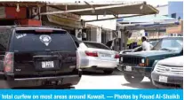  ??  ?? KUWAIT: For the second day in a row, vehicles crowded Shuwaikh Industrial on Monday as car repair shops continue to receive clients following the end of total curfew on most areas around Kuwait. — Photos by Fouad Al-Shaikh