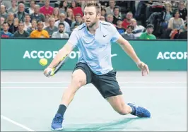  ??  ?? Jack Sock returns the ball to Filip Krajinovic during the final in Paris.