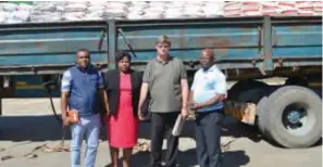  ??  ?? Minister of State for Manicaland Province Ellen Gwaradzimb­a (second from left) and Chimaniman­i East MP Joshua Sacco (second from right) are flanked by Roy Nyakunuwa (acting head, FBC Group Marketing — far left) and Juzeyi Olisi (FBC Bank Mutare Branch manager) as they pose with the FBC donation towards Cyclone Idai.