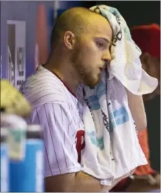  ?? CHRIS SZAGOLA — THE ASSOCIATED PRESS ?? Phillies starting pitcher Jake Thompson towels off after finishing his finest start in the big leagues. Of course, thanks to his inept offense, it still went down as a 4-0 loss for the Phils.