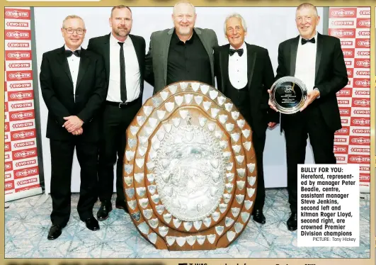  ?? PICTURE: Tony Hickey ?? BULLY FOR YOU: Hereford, represente­d by manager Peter Beadle, centre, assistant manager Steve Jenkins, second left and kitman Roger Lloyd, second right, are crowned Premier Division champions