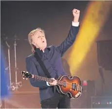  ?? REUTERS ?? Sir Paul McCartney performs on the Pyramid stage at Worthy Farm in Somerset during the Glastonbur­y Festival in Britain on Saturday night.