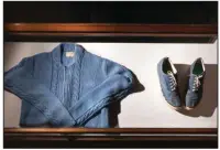 ?? (Courtesy of Rollins College/Scott Cook) ?? A sweater and a pair of tennis shoes were given to Rollins College by Fred Rogers in 1991 on the occasion of his 40th college reunion.
