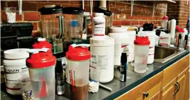  ??  ?? Chemicals: Bodybuildi­ng drinks and pills in dealer’s kitchen