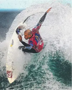  ??  ?? Kelly Slater carving up Bells Beach.