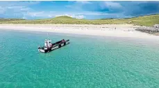  ?? ?? The landing craft at Taransay.