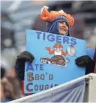  ??  ?? Fans watch as the Memphis Tigers take on the Houston Cougars at the Liberty Bowl on Nov. 23, 2018. JOE RONDONE/THE COMMERCIAL APPEAL