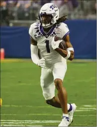  ?? Rick Scuteri / Associated Press ?? TCU wide receiver Quentin Johnston during the first half of the Fiesta Bowl against Michigan on Dec. 31 in Glendale, Ariz.