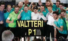  ??  ?? Race winner Valtteri Bottas with his Mercedes AMG F1 celebrates with the team at the Russian Grand Prix.