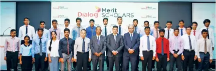  ??  ?? Dialog Merit Scholars with (from left) University Grants Commission Vice Chairman Professor P.S.M. Gunaratne, Board of Investment Chairman Dumindra Ratnayaka, Dialog Axiata PLC Group Chief Executive Supun Weerasingh­e and Dialog Axiata PLC Group Chief Corporate Officer Shayam Majeed
