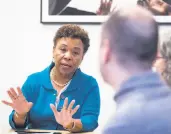  ?? Jessica Christian / The Chronicle ?? Rep. Barbara Lee, D-Oakland (left), asks FDA worker Chad Davis-Montgomery and EPA employee Bethan Dreyfus how the shutdown has hurt them.