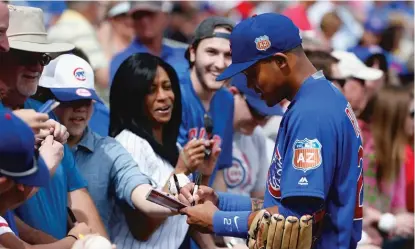  ?? | AP (TOP), GETTY IMAGES ?? Cubs fans are fired up about the team’s long-ball potential, including that of second-year players Kyle Schwarber (top) and Addison Russell. On the so-called sophomore jinx, Russell said, “Slumps and stuff ... are all part of the game.”