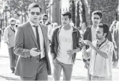  ?? JOHN JOHNSON, WALT DISNEY PICTURES ?? J.B. Bernstein (Jon Hamm, with Madhur Mittal, Suraj Sharma and Pitobash) scouts the cricket leagues in Million Dollar Arm.