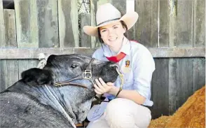  ?? PHOTO: LAURA HUNT ?? READY TO COMPETE: Downlands College student Phoebe Bridges will compete as part of the school’s cattle show team at the upcoming Heritage Bank Ag Show.