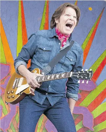  ?? BARRY BRECHEISEN/The Associated Press ?? John Fogerty performs at the New Orleans Jazz and Heritage Festival in New Orleans on May 4. He makes his
way to Moose Jaw on Nov. 20 and the Credit Union Centre the next night, on Nov. 21.