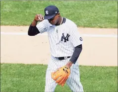  ?? Sarah Stier / Getty Images ?? Yankees starter Domingo German heads to the dugout at the end of the second inning against the Blue Jays on Sunday.