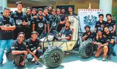  ??  ?? Students of Manipal Academy of Higher Education with their self-made all-terrain-vehicle at Technovanz­a 2018.