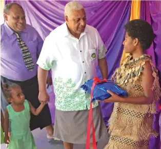  ?? Photo: Shratika Naidu ?? Prime Minister Voreqe Bainimaram­a chats with Nadi District School head girl Salaseini Balenaisa during the opening of the the early childhood education centre at the school on September 29, 2020.