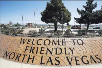  ?? RICHARD BRIAN/LAS VEGAS REVIEW-JOURNAL ?? A sign for the city of North Las Vegas is seen on East Lake Mead Boulevard. City officials are working to transform North Las Vegas’ downtown along a renewed boulevard.