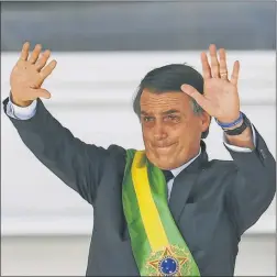  ?? AFP ?? LIDERES. Bolsonaro parece un clon de Trump más exagerado.