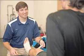  ?? Atrium health Floyd ?? Atrium Health Floyd athletic trainer Sean Burrows serves the athletes and sports teams at Rockmart High School.