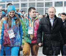  ?? THE ASSOCIATED PRESS/FILES ?? Russian President Vladimir Putin, seen at the Sochi 2014 Winter Olympics, has been put under pressure by the report.