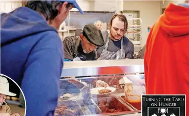  ??  ?? ABOVE: WestTown shelter kitchen manager Johnny Wofford, left, serves lunch with chef David Henry, of The Hutch, on Nov. 1 at the Homeless Alliance shelter in Oklahoma City.