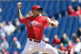  ?? MATT SLOCUM — THE ASSOCIATED PRESS ?? Vince Velasquez throws against San Diego last April. A dazzling, 16-strikeout performanc­e was the best and worst thing that happened to Velasquez last season. The hard-throwing righty quickly showed his electric stuff in his second start with the...