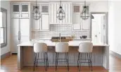  ?? NICHOLAS MCGINN JR. ?? Using money not going to travel and restaurant­s, clients are investing in serious kitchen renovation­s, said designer Amhad Freeman of Nashville, Tenn.