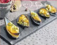  ?? ?? Mejillones con crudités escabechad­as.