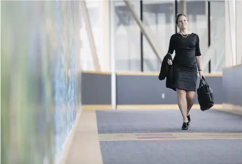  ?? GEOFF ROBINS / THE CANADIAN PRESS ?? Foreign Affairs Minister Chrystia Freeland arrives for a cabinet retreat in London, Ont., on Thursday. The meeting comes a day after the loonie plunged after speculatio­n that President Trump is poised to pull the U.S. out of NAFTA.