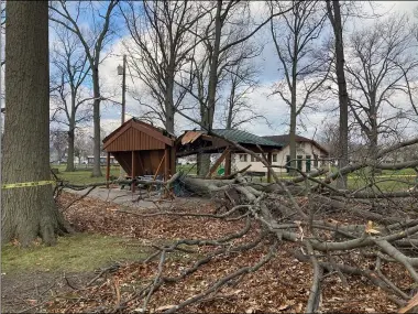  ?? SUBMITTED ?? Branches were scattered and the Rotary Club picnic shelter was smashed when Lorain Public Property Department workers arrived to clean up on Nov. 16, 2020. Strong winds Nov. 15, 2020, blew over an oak tree that crashed through the roof of the shelter, which was dedicated in 1967.