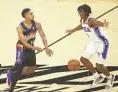  ?? PATRICK BREEN/THE REPUBLIC ?? The Suns' Cameron Payne, left, drives against the 76ers' Tyrese Maxey on Feb. 13 in Phoenix.