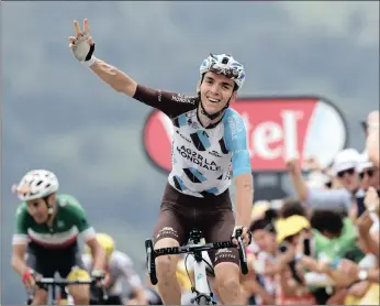  ?? PICTURE: AP ?? France’s Romain Bardet celebrates as he crosses the finish line to win the twelfth stage of the Tour de France over 214.5km with start in Pau and finish in Peyragudes yesterday. Italy’s Fabio Aru, left, finished second.