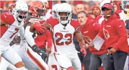  ?? AP ?? Cardinals cornerback Robert Alford (23) returns an intercepti­on during Sunday’s win against the Browns in Cleveland.