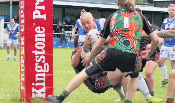  ?? Aidy Gleeson snr ?? ●●Mayfield’s Mark Biggins crosses for a try against Myton Warriors at the weekend – but was unable to avert a shock result. See page 51