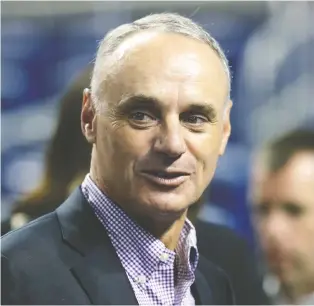  ?? ROB CARR/GETTY IMAGES FILES ?? MLB Commission­er Rob Manfred spelled out many of the details of the league’s plan to return to play in an interview with CNN on Thursday night.