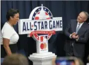  ?? ASSOCIATED PRESS FILE ?? Muriel Bowser, left, Mayor of the District of Columbia, and Rob Manfred, Commission­er of Baseball, react at a news conference to unveil the 2018 MLB All-Star Game logo in Washington.