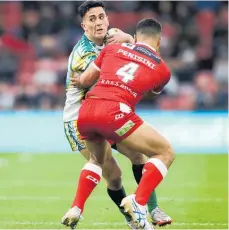  ?? Photo / AP ?? Kayal Iro and the Cook Islands were cannon fodder under the current RLWC format.