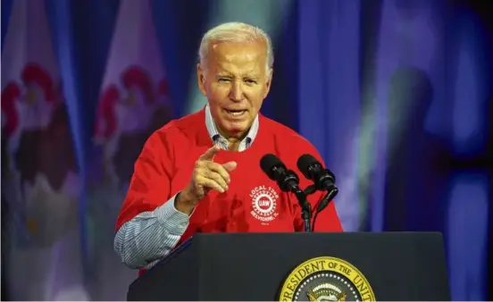  ?? SCOTT OLSON/GETTY IMAGES ?? President Biden celebrated the scheduled reopening of Stellantis’ Belvidere Assembly Plant in Illinois on Thursday.