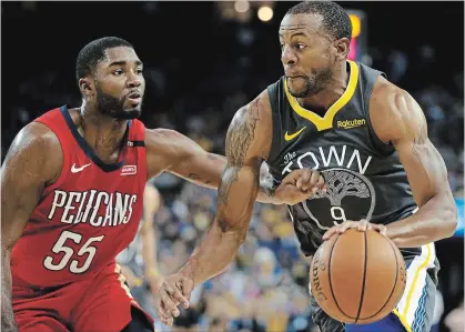  ?? ANDA CHU TNS ?? Golden State’s Andre Iguodala drives to the basket against New Orleans Pelicans’ E’Twaun Moore. Oakland is off to a good start.