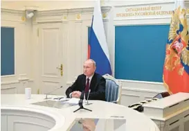 ?? ALEXEI BABUSHKIN/KREMLIN POOL PHOTO ?? Experts believe an aggressive posture in response to Russian President Vladimir Putin’s nuclear threats puts the world in more danger.