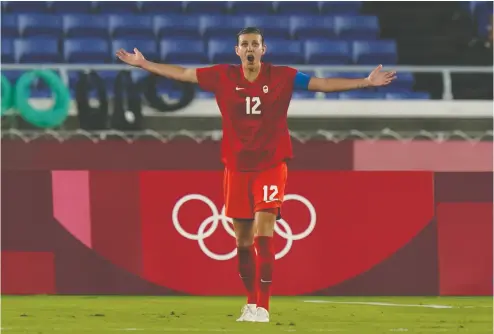  ?? ADRIAN WYLD / THE CANADIAN PRESS ?? For now, Canada’s Christine Sinclair is looking forward to returning to the Portland Thorns.