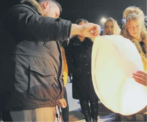  ??  ?? Amber’s Law supporters release lanterns at Roker.