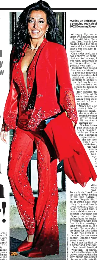  ?? ?? Making an entrance: Nancy in a plunging red catsuit for a 2002 Downing Street event