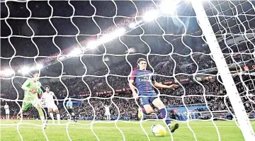  ?? — AFP photo ?? Paris Saint-Germain's Uruguayan forward Edinson Cavani scores his second goal during the French L1 football match between Paris Saint-Germain (PSG) and Nice (OGC Nice) on October 27, 2017, at the Parc des Princes stadium in Paris.