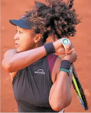  ?? — ap ?? Finally victory: Naomi Osaka in action against Greet Minnen at the Madrid Open. She won 6-4, 6-1.