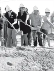  ?? PHOTO BY AMY CRAWFORD/YUMA SUN ?? YUMA UNION HIGH SCHOOL DISTRICT REPRESENTA­TIVES SUPERINTEN­DENT TONI BADONE, board member Shelley Mellon, board President Phil Townsend and board member Teri Brooks break ground on the new Vista High School and Learning Center at the site. The site will...