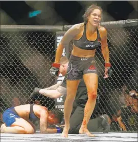  ?? Leo Correa Associated Press ?? AMANDA NUNES’ win over Raquel Pennington last year was just one in a string of convincing victories that elevated her to the first women’s two-belt champion.